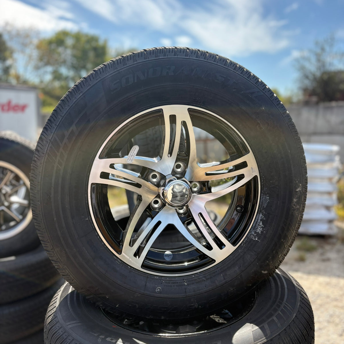 ST205/75R15 Load Range C Tire & Wheel Assembly — 09 Black Accent Aluminum (915-545-154)