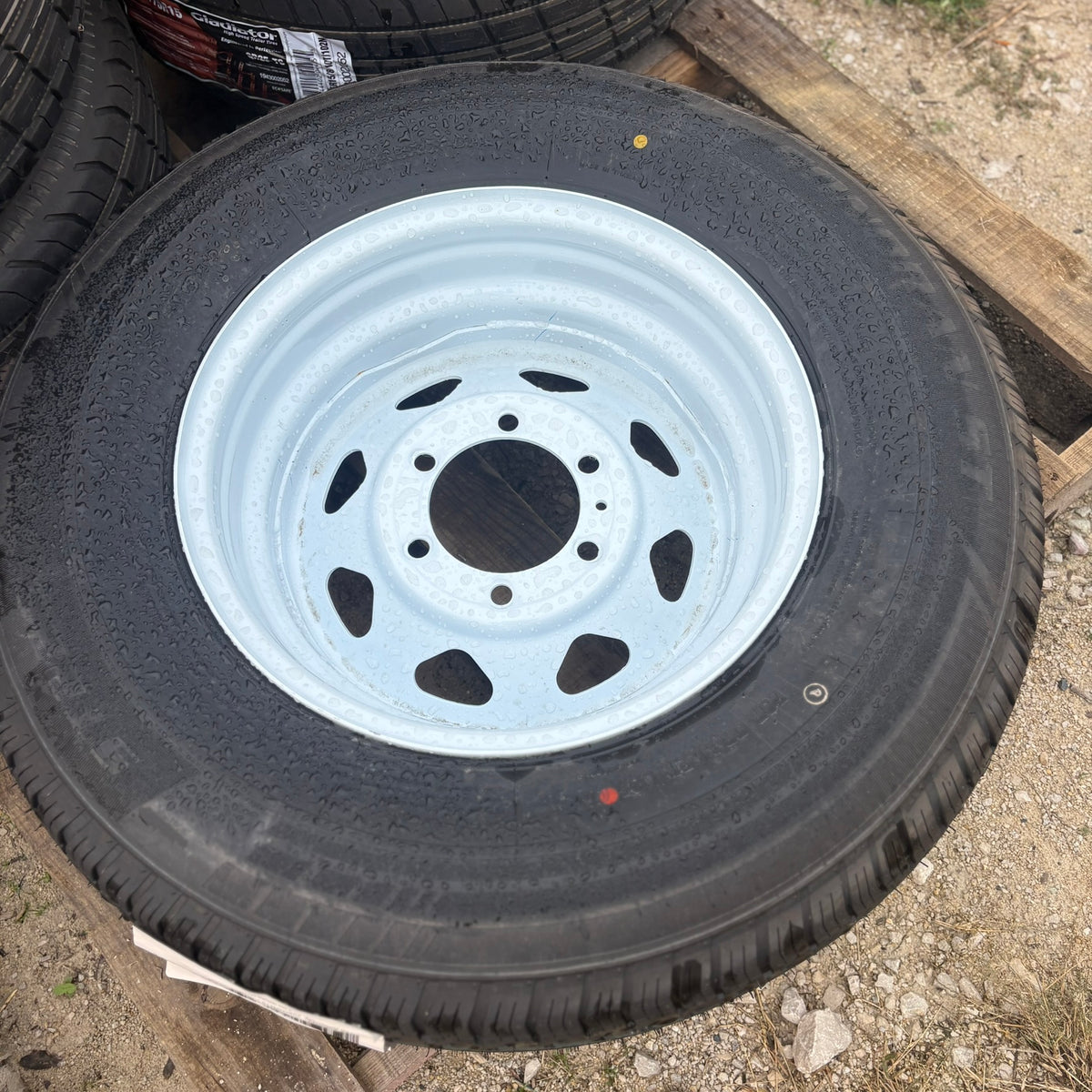 225/75R15 Load Range E Tire & Wheel Assembly — White Wagon Wheel (225-75-R15-LRE-15x5-655-WW)
