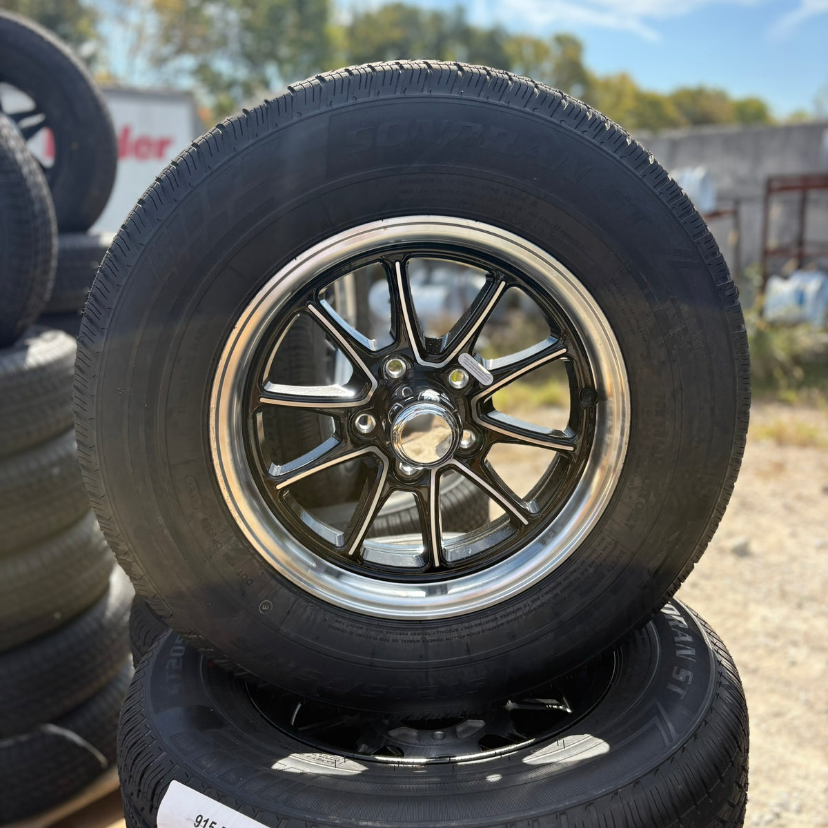 ST205/75R15 Load Range D Tire & Wheel Assembly — LV Black Machine Lip Aluminum (915-545-138)