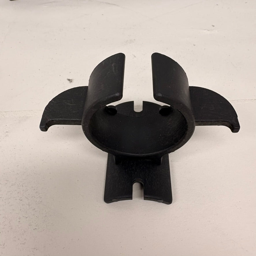 Need a Trailer Part black plastic 7-way trailer plug and safety chain holder for secure electrical storage