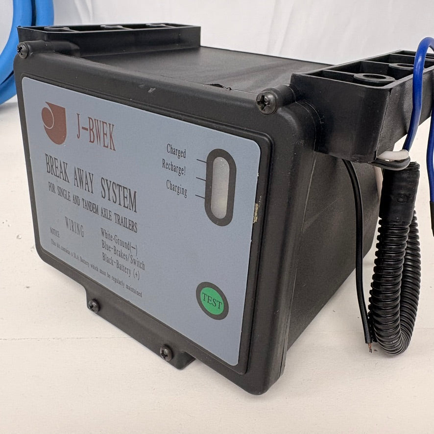 Need a Trailer Part cold-weather trailer breakaway system with black housing and test button for 7-way RV connections