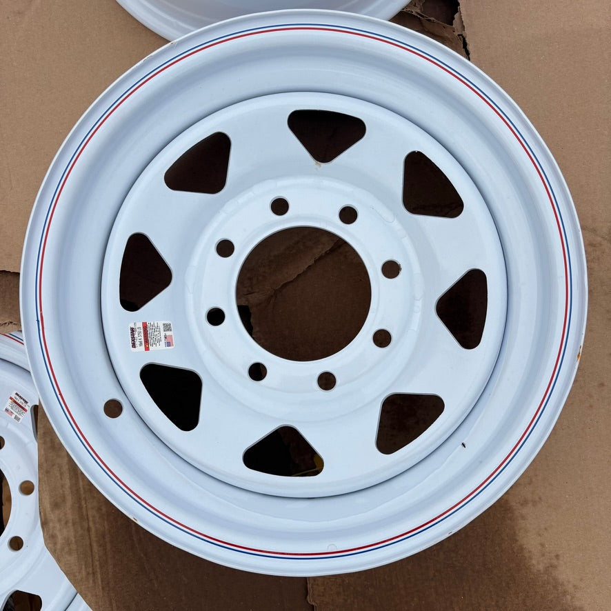 Need a Trailer Part 16x6 white modular steel trailer wheel with 8 on 6.5 bolt pattern and red and blue pinstriping.