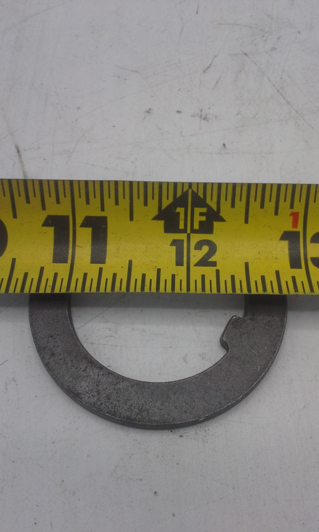 WASHER TONGUE 1 3/4 .134 12K (005-060-00)