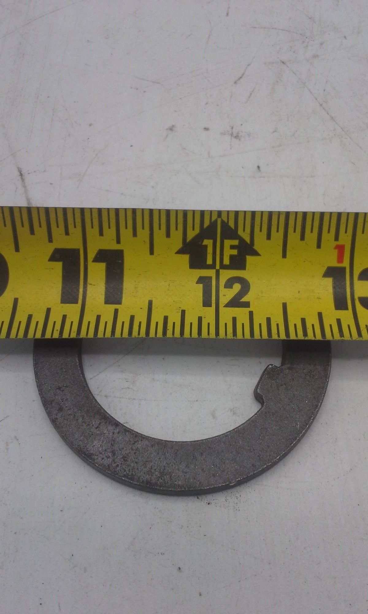 WASHER TONGUE 1 3/4 .134 12K (005-060-00)