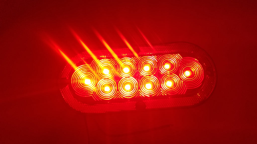 Flat 6″ Oval Surface Mount LED Stop/Turn/Tail Light with Integrated Reflector (J-65-FRX)