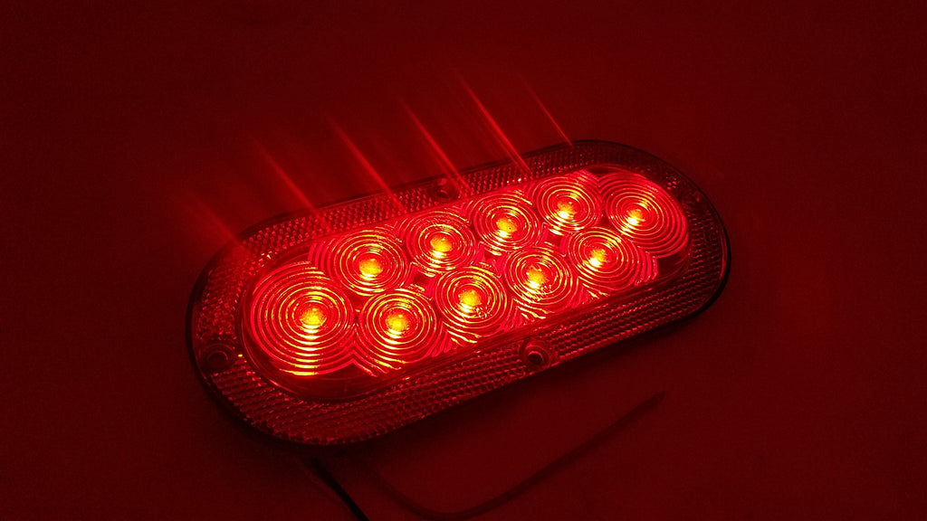 Flat 6″ Oval Surface Mount LED Stop/Turn/Tail Light with Integrated Reflector (J-65-FRX)