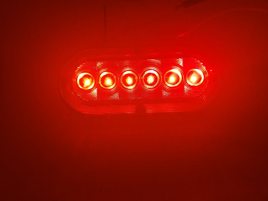Surface mount Flat 6" Oval LED S/T/T, CLEAR Lens, Red 6 Diode, Red Reflective  (J-656-FRCX)